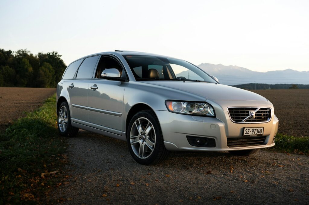 Silver Volvo estate car parked at the roadside